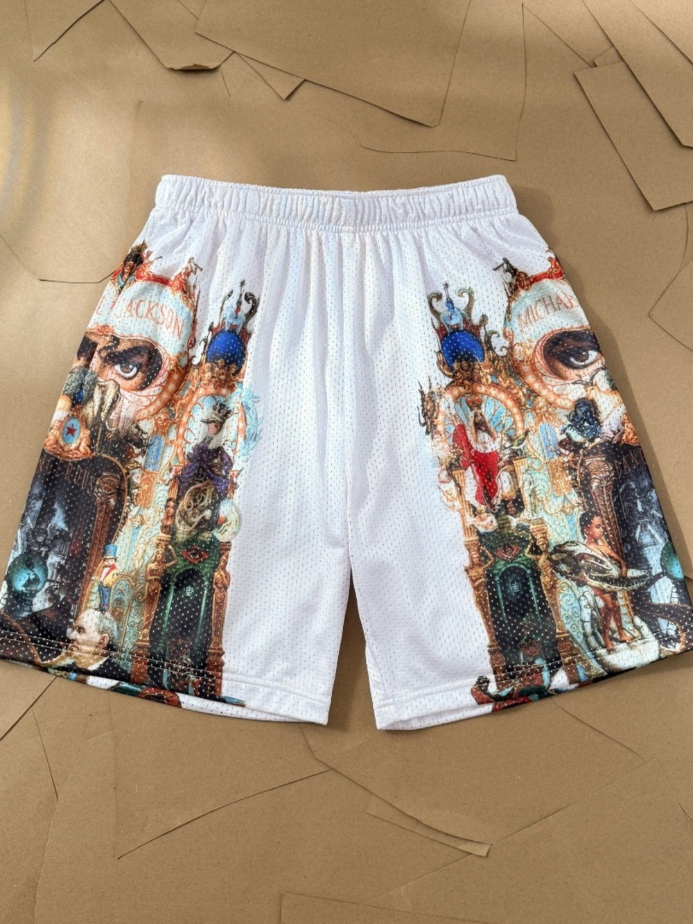Supreme White Mesh Athletic Shorts with Multi-Color Graphic Panels